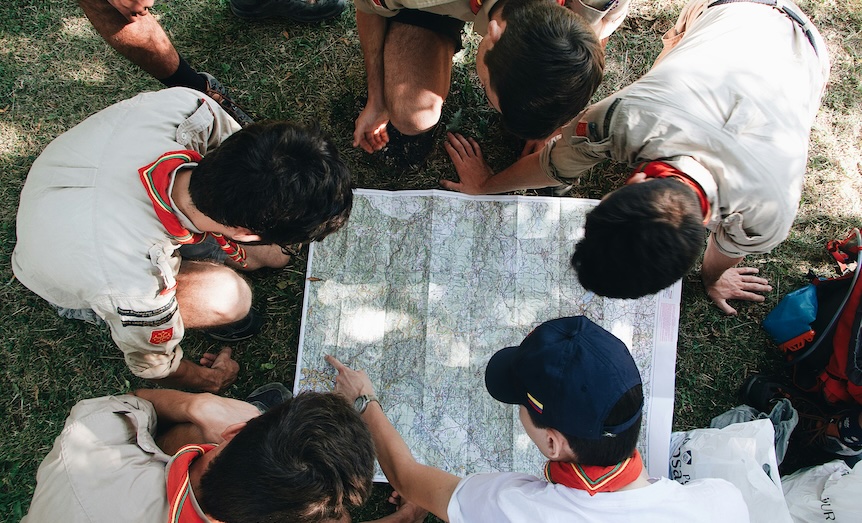 Image of Boy Scouts reading a map, used to illustrate being prepared.
